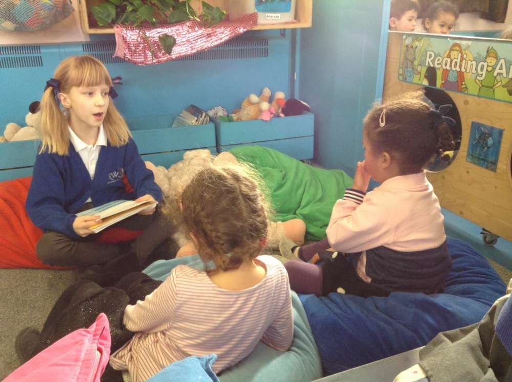 Nursery Class & Year 4 Share Stories!