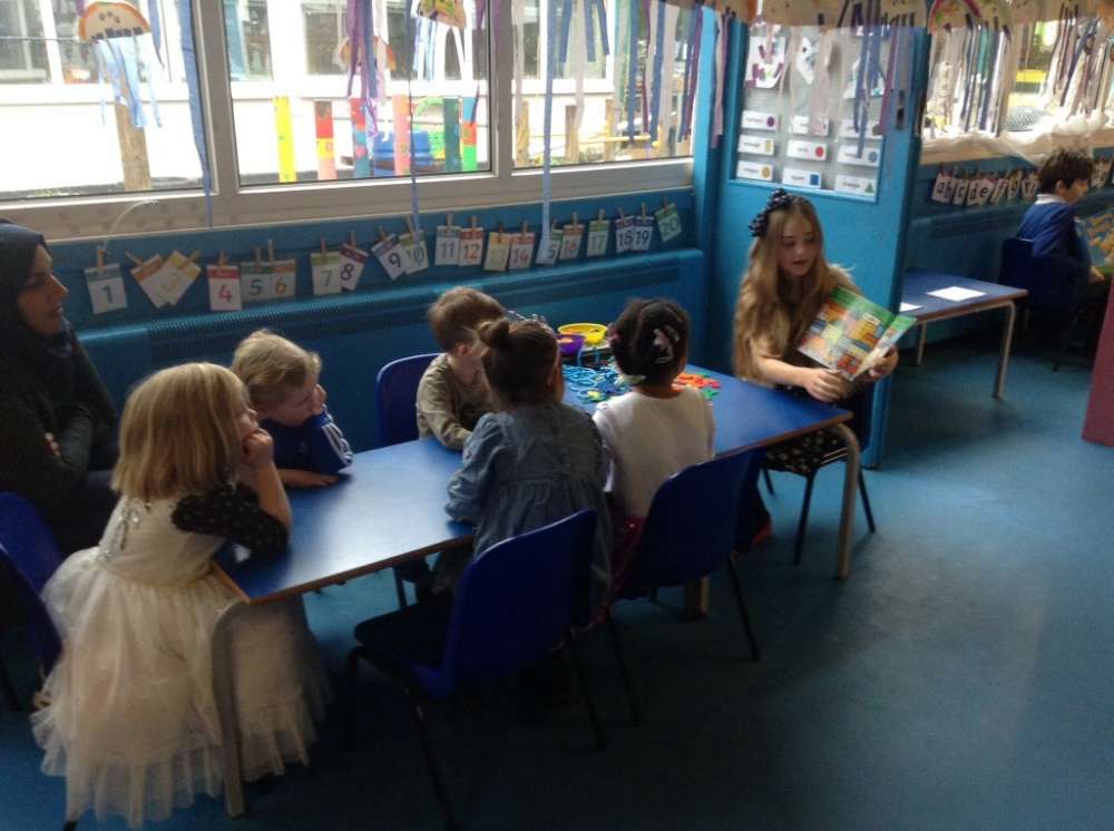 Nursery Class’ Story time with Year 6!